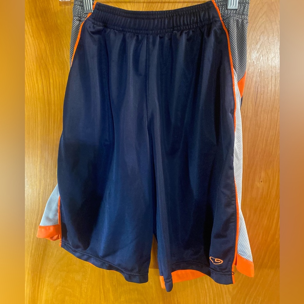 Boys “CHAMPION” blue, white and orange basketball shorts